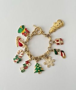 Vintage 1960s-1970s Gold Tone Christmas Charm Bracelet – Enamel Santa, Snowman, Tree, Snowflake